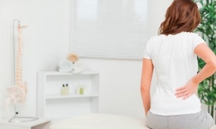 причини за болки в гърба при жените